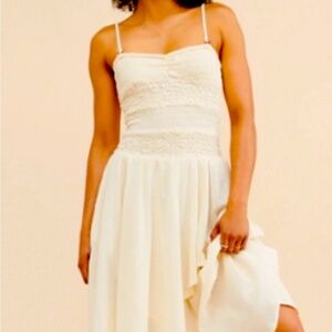 Never worn dress drop waist it’s very pretty just not for me and its100% cotton